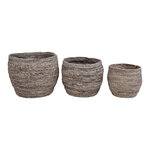 3 paniers gris et ronds en feuilles de maïs