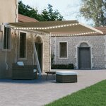 vidaXL Auvent manuel rétractable avec LED 450x300 cm Crème